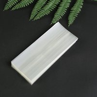 Bandes thermorétractables transparentes en PVC/PET personnalisées en gros avec perforation pour les scellages de bouteilles en plastique/verre