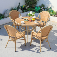 Meubles de table à manger de jardin en rotin extérieur de conception moderne nordique ensembles de patio luxueux en fonte d'aluminium pour hôtels et parcs