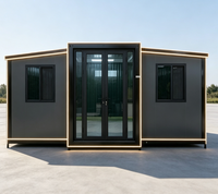 Maison préfabriquée moderne gris anthracite, pliable, avec double porte vitrée, éclairage LED, installation rapide, extensible, maison modulaire en conteneur