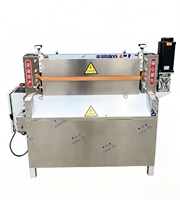 Machine industrielle motorisée de découpe de bandes de caoutchouc pour la fabrication de pneus et le traitement des feuilles de caoutchouc