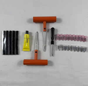 Kit de réparation de pneus anti-crevaison 29 pièces avec poignée métallique, bandes de caoutchouc auto-adhésives et vis de réparation de pneus - Product Image 1