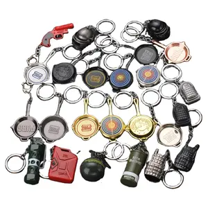 गर्म बिक्री सस्ते धातु कीरिंग हथियार नि: शुल्क नमूने चाबी का गुच्छा pubgs keychains हेलमेट बैग स्तर भड़क बंदूक