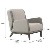 Fauteuil de salon de luxe moderne au design nordique ergonomique et confortable, en cuir et bois, avec accoudoirs, pour hôtel