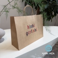 Sacs en papier kraft avec poignées, sacs de courses écologiques et sacs d'emballage pour vêtements avec logo personnalisé disponible