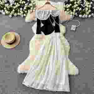 Ensemble élégant 2 pièces pour femmes, haut asymétrique et jupe en maille patchwork taille haute, vêtements en gros - Product Image 1