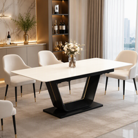 Table à manger moderne de luxe en pierre frittée avec pieds en fer en forme de U et plateau en verre composite pour l'ameublement de la maison