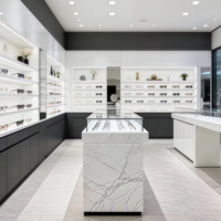 Comptoir d'exposition moderne de luxe en acier inoxydable avec éclairage LED, marque Maxsen, options or/noir pour lunettes haut de gamme sur mesure