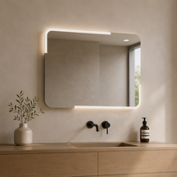 Miroir mural LED géométrique asymétrique moderne, forme irrégulière à encoches, sans cadre, sculptural, pour salle de bain de luxe