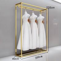 Présentoir de Luxe en Acier Inoxydable Doré pour Robes de Mariée – Étagères Professionnelles pour Boutiques de Vêtements et Magasins de Mariage