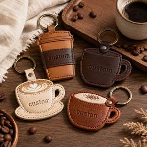 พวงกุญแจหนัง PU รูปทรงแก้วกาแฟหลากหลายสไตล์ OEM ODM พร้อมโลโก้ปั๊มนูนสุดพิเศษ  พร้อมสายคล้องแบบโซ่  สำหรับใช้เป็นจี้กระเป๋า - Product Image 1