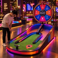 Jeu de golf interactif avec roue des prix colorée, défi de mini-golf, solution tout-en-un pour la location d'événements en parc d'attractions intérieur
