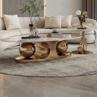 Ensemble de table basse moderne de luxe 2025 avec base en acier inoxydable doré, plateau en pierre frittée ovale facile à nettoyer, qualité supérieure pour la maison