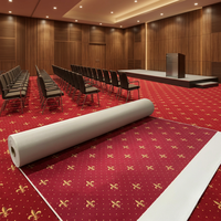 Moquette commerciale Axminster rouge ignifuge mur à mur pour hôtels, idéale pour les banquets et les halls d'accueil de haute qualité