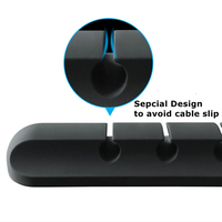Organisateur de câbles USB mural et de bureau en silicone noir avec clips enrouleurs et support de gestion des câbles