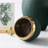 Pot de fleur décoratif de luxe au design moderne pour la maison pots en céramique plaquée or pour plantes