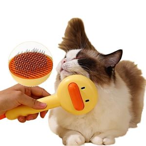 Brosse à poils pour animaux de compagnie en plastique auto-nettoyante, à dents courbées en forme de canard, portable, pour chats et chiens - Douce, facile à utiliser, pour attraper les poils lâches - Product Image 1
