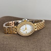 Montre à quartz vintage IEKE, best-seller transfrontalier, montre de luxe tendance ovale sertie de diamants pour femmes avec bracelet en acier fin