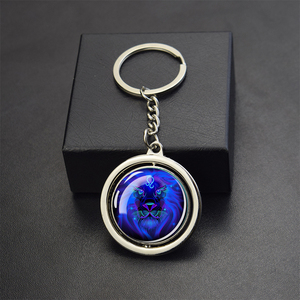 Llavero de Metal con Cristal Giratorio de Alta Calidad con Diseño de los 12 Signos <span class=keywords><strong>del</strong></span> Zodiaco en Cúpula de Cristal - Product Image 1