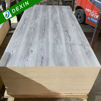 Contreplaqué mélaminé blanc, brun, gris de haute qualité 4x8, feuilles de bois de première classe haute résistance pour la fabrication de meubles