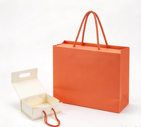Boîte à chaussures de sport en carton rigide magnétique pliable écologique, personnalisable avec logo, orange vif, emballage de chaussures torsadé, vente en gros