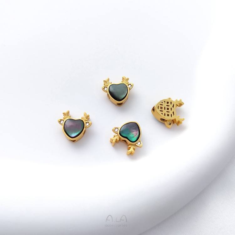 La perle tête de cerf de couleur noire de 10x9,5 mm a