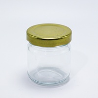 Vente en gros de pots en verre transparent ronds écologiques avec couvercles en métal pour le stockage du miel, des confitures, de l'huile d'olive et du sucre