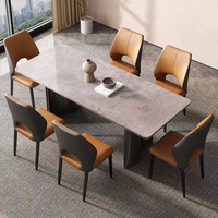 Chaise de salle à manger moderne de luxe italienne, structure en acier carbone, cuir, éponge haute résilience, dossier ergonomique creux, hôtel, restaurant