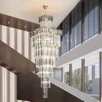 Lustre moderne en fer chromé et cristal pour hall d'hôtel de luxe avec LED, hauteur réglable et intensité variable