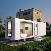 Cabine intelligente compacte et contemporaine de 9m pour le glamping Pod Apple Tiny House Solution Space Capsule Caractéristiques Villa préfabriquée en acier pour hôtel