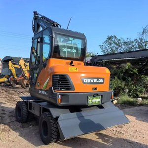 Excavatrice sur pneus Doosan DX60W d'occasion, 6 tonnes, petite machine, bon état. - Product Image 1