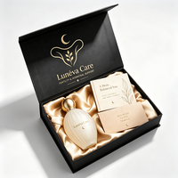 Boîte cadeau rigide magnétique noire personnalisée avec logo en feuille d'or et doublure en satin pour les coffrets cadeaux bien-être et les marques de soins personnels