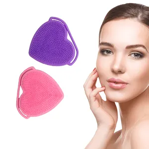 Fábrica personalizada 2 en 1 multifuncional en forma de corazón de doble cara cepillo de lavado de cara cepillo de limpieza Facial de silicona