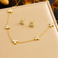 Ensemble de bijoux collier et boucles d'oreilles tendance XIXI ensemble de bijoux en acier inoxydable plaqué or 18 carats avec fleur pour cadeaux
