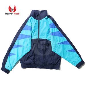 Chaqueta Cortavientos Colorblock al por Mayor, Ligera, Resistente al Agua, con Capucha, Ropa Deportiva para Exteriores para Hombre y Mujer - Product Image 1