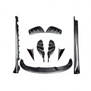 Kit carrosserie pour Porsche Taycan style MR en fibre de carbone sèche : pare-chocs avant et arrière, diffuseur, lèvres de pare-chocs, jupes latérales, aérations arrière - Product Image 1