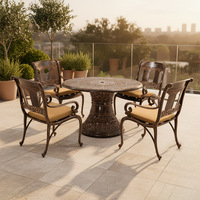 Ensemble de table à manger ronde d'extérieur de style européen en fonte d'aluminium pour hôtel et restaurant de luxe