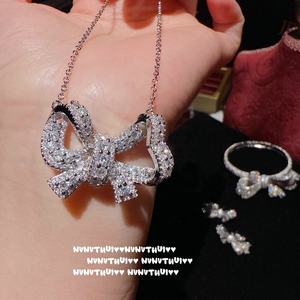 Collana e anello di zirconi a farfalla francese in ottone placcato oro ispirati al braccialetto di gemme con fiocco della famiglia per gli anniversari - Product Image 3