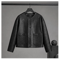 Veste en cuir de mouton pleine fleur noire pour femme, col rond, boutons-pression métalliques, patch tissé à la main, épaules tombantes, coupe courte, manteau de luxe