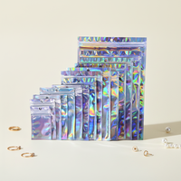 Sacs laser perforés auto-scellants 7*10cm 9*12cm 10*15cm 12*20cm 14*20cm pour bijoux, étuis de téléphone, pochettes holographiques en plastique