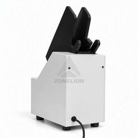Machine de redressement de papier avec réduction du bruit, structure interne, contrôle intelligent du temps et alignement des piles de papier