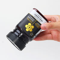Muster Verfügbar Großhandel Quadratischer 360ML/500G Lebensmittel-Honigbehälter Kunststoff-PET-Dose Mit Schwarzen Sicherheitsdeckeln