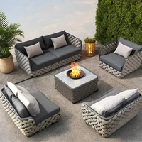 Mobilier d'extérieur de style nordique Table basse et chaise Ensemble de canapés de patio de luxe en aluminium Fabricant de canapés de jardin en corde tissée en rotin