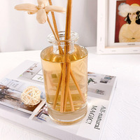 Bouteilles de diffuseur d'aromathérapie en verre rechargeables rondes transparentes de 150ml avec décoration de couvercle noir
