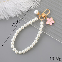 Offre Spéciale divers modèles fleur coeur coquille perle porte-clés alliage métal voiture porte-clés perle Bracelet perlé porte-clés accessoires