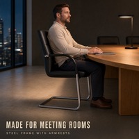 Chaise de bureau exécutive moderne en cuir avec accoudoirs fixes et base métallique pour conférence et bureau à domicile