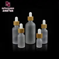 Botella de vidrio esmerilado botella de bambú tapa cuentagotas de aceite esencial 5ml 10ml 15ml 20ml 30ml 50ml 100ml
