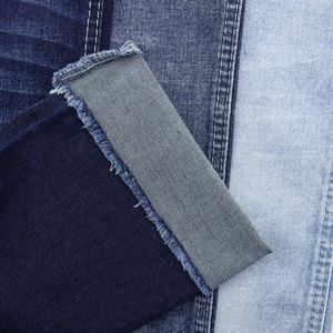 Tissu en denim de coton 12,1 oz toutes saisons, matériau extensible indigo slub pour la production de vêtements - Product Image 2
