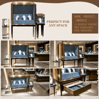 Vitrine de présentation de bijoux sur mesure, en verre avec bordure métallique et doublure en velours bleu, pour magasin de bijoux de luxe