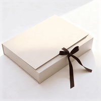 Boîte en papier rigide personnalisée en carton avec logo imprimé non ferreux de haute qualité Boîte d'emballage cadeau beige avec ruban pour cadeaux de qualité supérieure