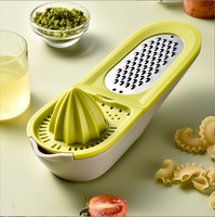 Vente chaude 2 en 1 multi-fonction citron presse-agrumes Gadget de cuisine presse-citron presse-agrumes légumes et fruits fil râpe ail broyeur